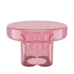 A straight-on front view of the handmade Napier Retro Glass Coffee Table in a soft pale pink finish, showcasing the thick tabletop and uniquely curved, four-stem base.