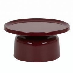 A straight-on front view of the Sigge Coffee Table in an on-trend gloss burgundy finish, showcasing its sturdy pedestal base and wide pressed metal top with a practical lipped edge.