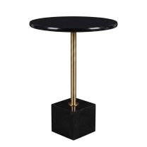 An angled front view of the luxurious Caliber Black Marble Side Table, highlighting the striking contrast between the round Spanish Nero Marquina top and the solid square marble base, connected by a brushed gold stem.