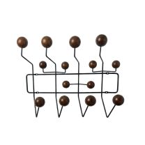 Front view of the Replica Charles Eames Coat Hanger, featuring a satin black wire frame and high-gloss walnut timber spheres.