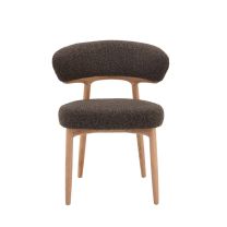 Front view of the Jemma Dining Chair featuring a solid natural ash timber frame and a thick 8cm brown boucle seat cushion.
