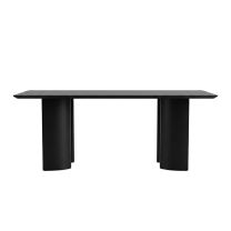 A straight-on view of the long side of the Munoz Dining Table in matte black, showcasing the 200cm rectangular top and the deeply inset curved steel legs creating a floating illusion.