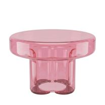 A straight-on front view of the handmade Napier Retro Glass Coffee Table in a soft pale pink finish, showcasing the thick tabletop and uniquely curved, four-stem base.