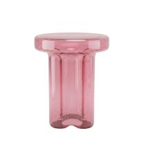 A straight-on front view of the handmade Napier Retro Glass Side Table in a soft pale pink finish, showcasing the thick tabletop and uniquely curved, flower-like base.