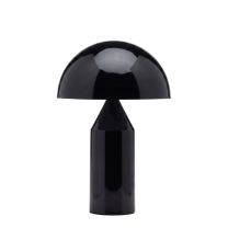 A straight-on front perspective of the high-gloss black Replica Atollo Bedside Lamp, highlighting the highly distinctive geometric illusion of the hemispherical metal dome balancing on the conical column.