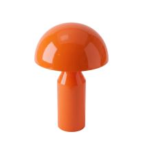 A slightly angled, top-down front perspective of the high-gloss orange Replica Atollo Bedside Lamp, highlighting the geometric transition from the hemispherical metal dome to the tapering conical column.