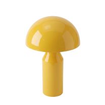 A straight-on front perspective of the high-gloss yellow Replica Atollo Bedside Lamp, highlighting the highly distinctive geometric illusion of the hemispherical metal dome balancing on the conical column.