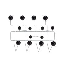 A straight-on front view of the Replica Charles Eames Coat Hanger, showcasing the crisp white symmetrical welded steel wire frame contrasting brilliantly with the 14 solid black wooden balls.