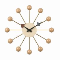 A straight-on view of the Natural Replica George Nelson Ball Clock, showcasing the solid timber spheres and the distinctive grey-blue and burgundy accents on the clock hands.