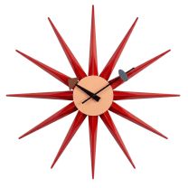 Front-on view of the mid-century inspired Replica George Nelson Starburst Clock, featuring vibrant red wooden rays radiating from a clean, minimalist steel clock face.