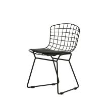 A front-angled view of the Black Replica Kids Bertoia Chair, highlighting its iconic mid-century shape scaled perfectly for children.