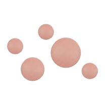 Front view of the Replica Muuto Dot Hanger set in Blush Pink, displaying the five different sized round hangers arranged together.