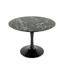 An angled front view of the 100cm Replica Tulip Table, showcasing the striking deep forest hues of the Italian Verde Green marble top resting on a sturdy black pedestal base.