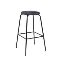 An angled view of the Retro Vintage Black Upholstered Bar Stool 75 cm Seat Height , highlighting its matte-black steel frame and the square upholstered seat with a corrugated stitching effect.