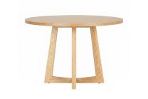 A front-angled view of the 120cm Zodiac Scandinavian Round Dining Table, showcasing the striking solid ash cross-leg base and the thick natural ash veneer top.