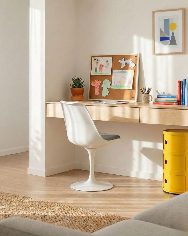Yellow Replica Componibili 3-tier unit tucked neatly under a kids study desk for back-to-school organization.