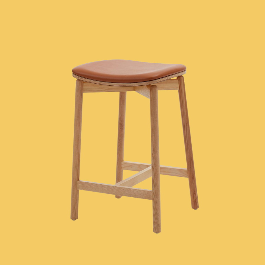 Emilie Timber Kitchen Stool – Natural with Tan Leather Seat Timber and Leather stool, with 4 solid Ash legs, a floating seat and padded seat pad with Tan leather upholstery