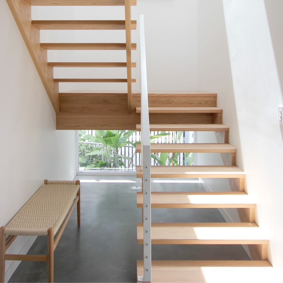 Modern Scandinavian Timber Bench with a Natural Cord Seat styled in the entry of a home