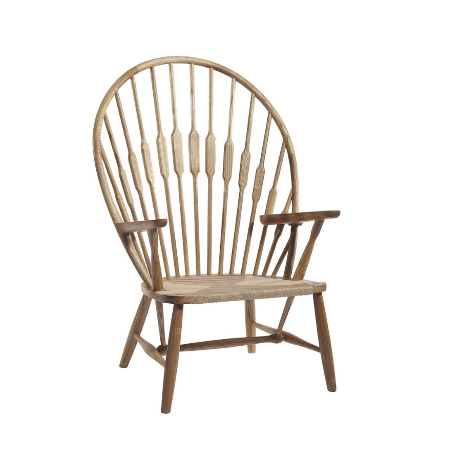 Solid Ash Timber Lounge Chair with Natural Cord Seat. Generous splayed spindle back rest resembling the feathers of a Peacock.