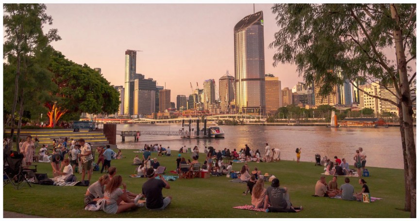 Local Brisbane shoppers enjoying a picnic at South Bank with a CBD view. Replica Furniture is proudly 100% Australian owned.	