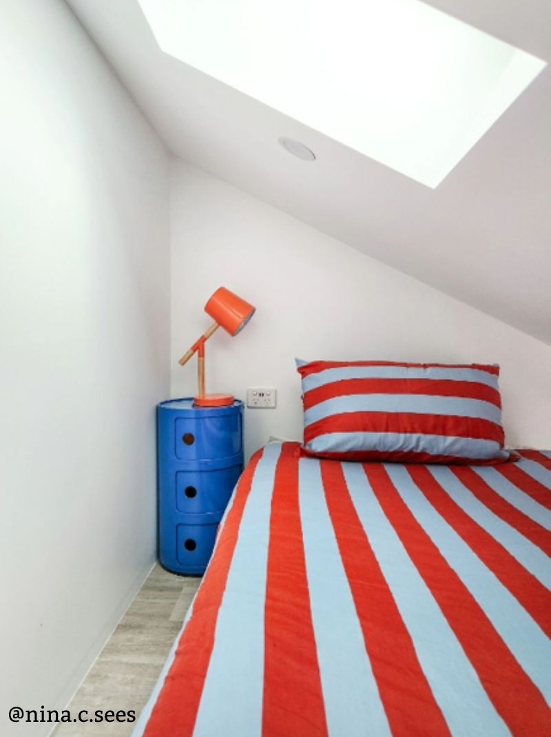 Replica Componibili Storage Unit Round Replica Componibili Storage Unit used as a bedside table and organizer.