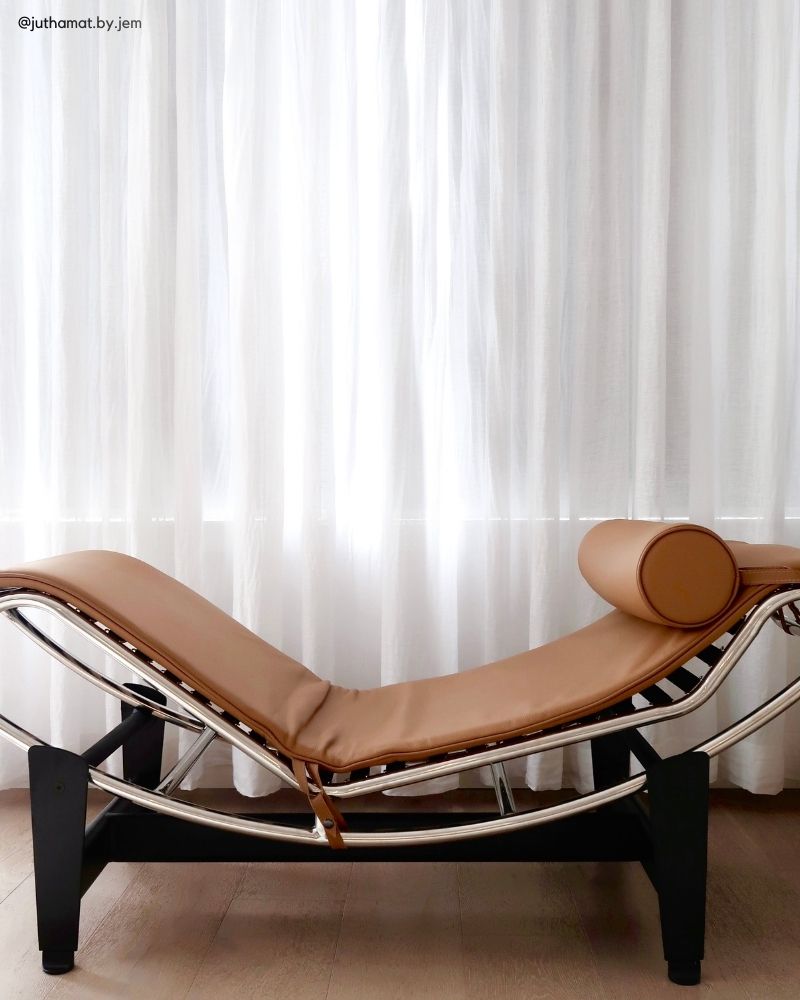 Modern living room featuring a Replica LC4 Chaise Lounge with high-density foam cushioning that retains its shape.