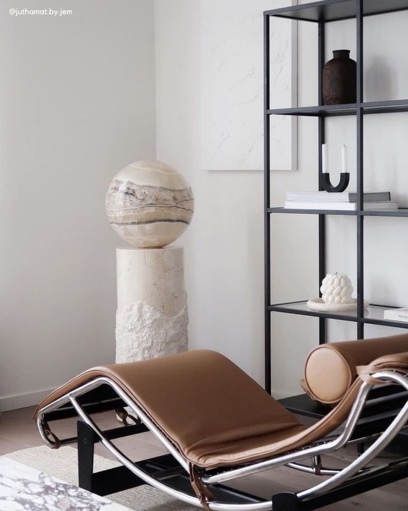 View the Replica Le Corbusier LC4 Chaise. Replica Le Corbusier LC4 Chaise Longue in tan leather, showing the ergonomic chrome frame.