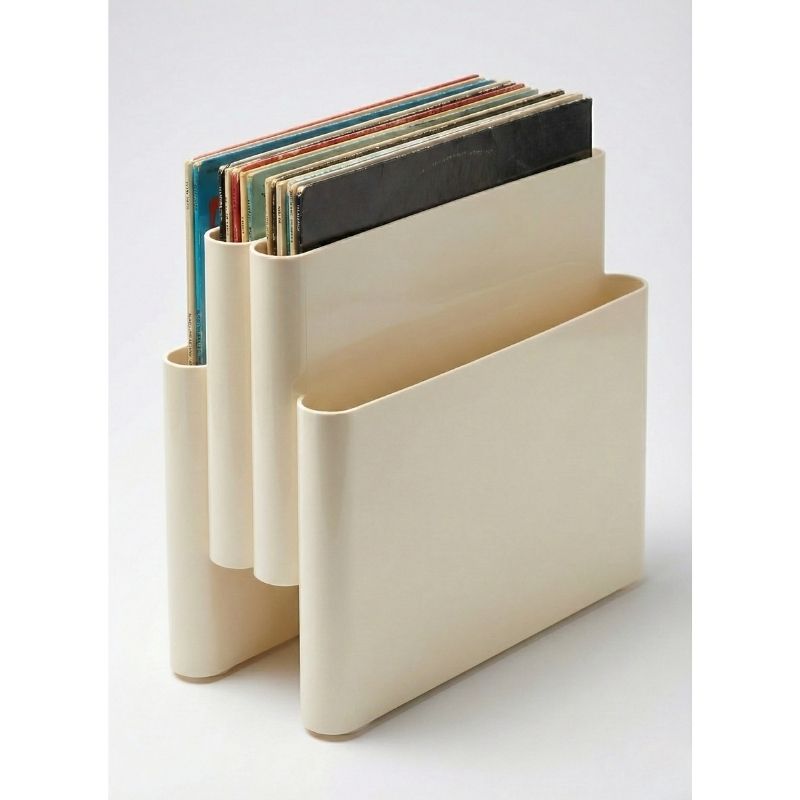 Styled retro accessories featuring the Replica Giotto Stoppino Magazine Rack and Vinyls Storage