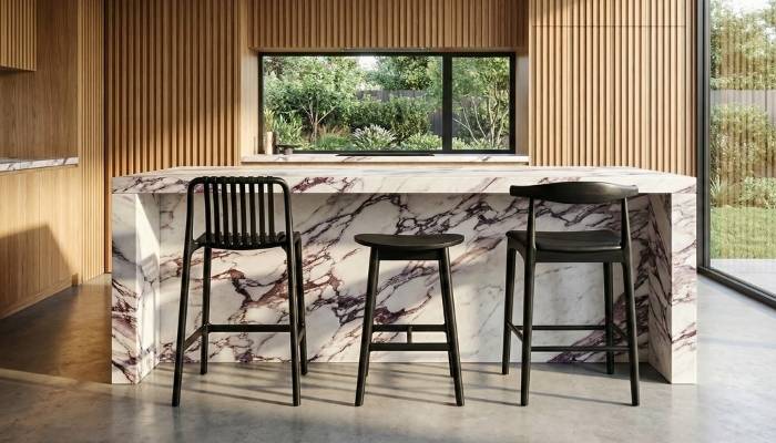 Comparison of best-selling kitchen stools: The Solid Ash Scandinavian Stool, the outdoor-suitable Bordeaux Stacking Stool, and Replica Elbow Stool.